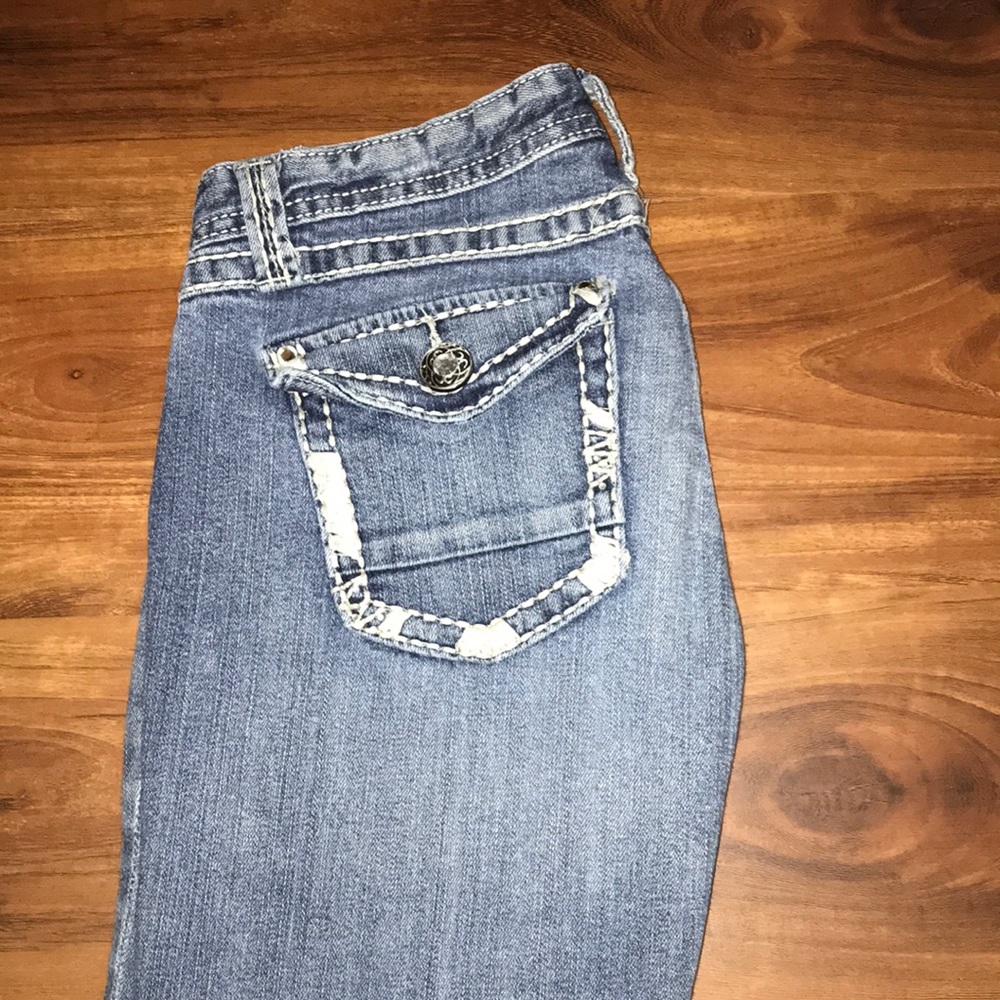 Light wash boot cut jeans